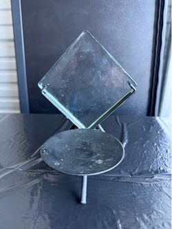 vintage metal and beveled glass candle holder.