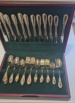 vintage Farberware "Breeze Gold" flatware set.