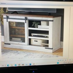 Wystfield 50” TV Stand By Ashley