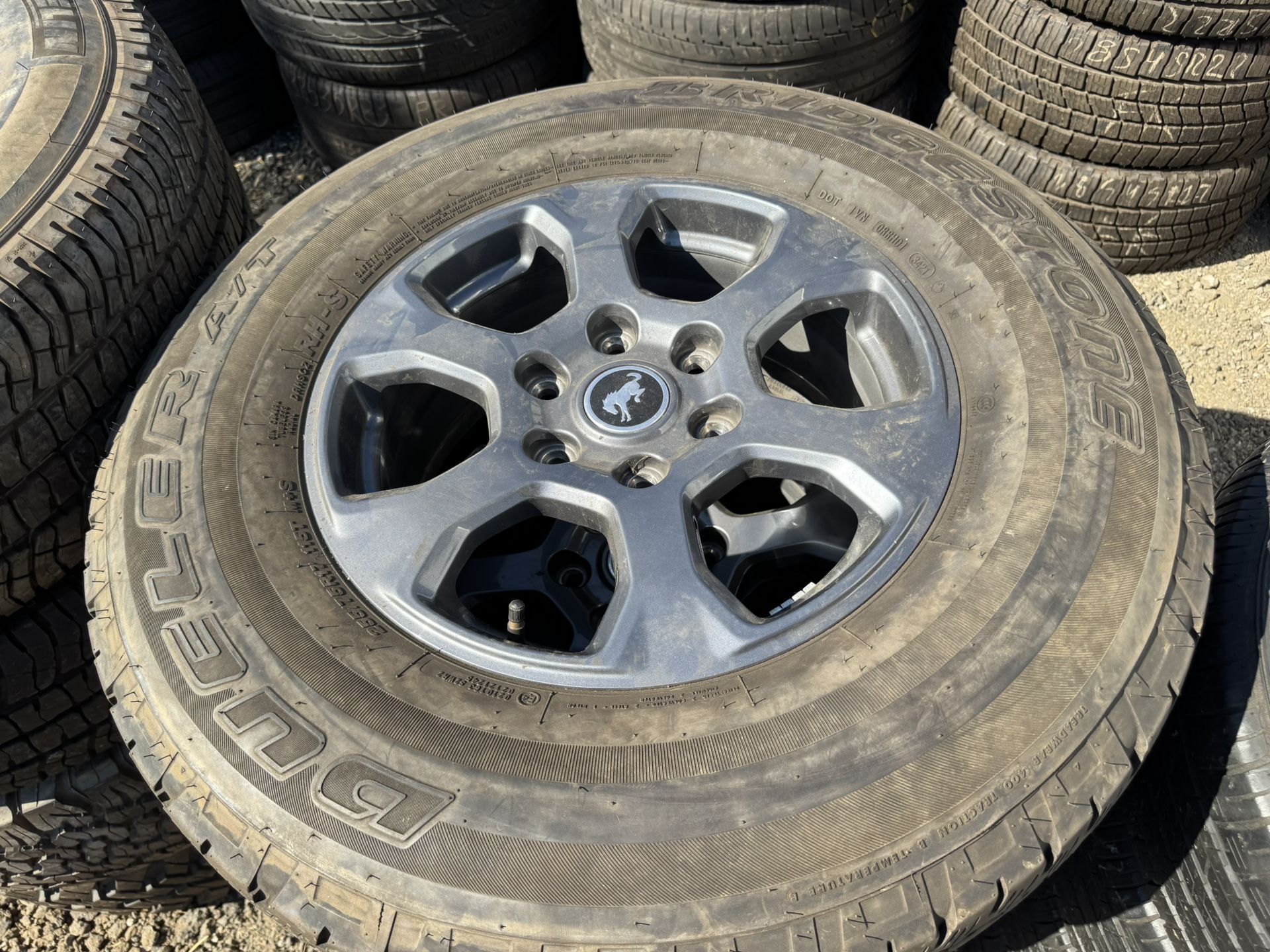 277/75R17 Bridgestone Tires And Original Wheels For Bronco Ford