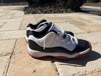 Jordan 11 Low 4y $100