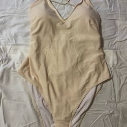 Cream color 1pc swimsuit with lace cover up skirt. Size 3X