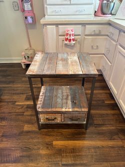 Beautiful table with drawers.