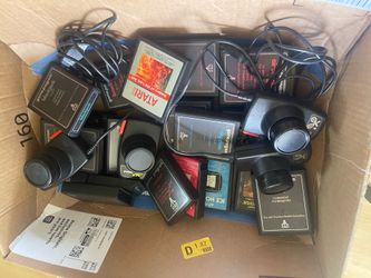 Description BOX OF VINTAGE ATARI GAMES AND CONTROL PADDLES 1(contact info removed) OVER 20 GAMES & 4 controllers