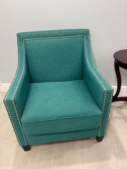 Beautiful teal studded chair. I love this chair but am moving and must go