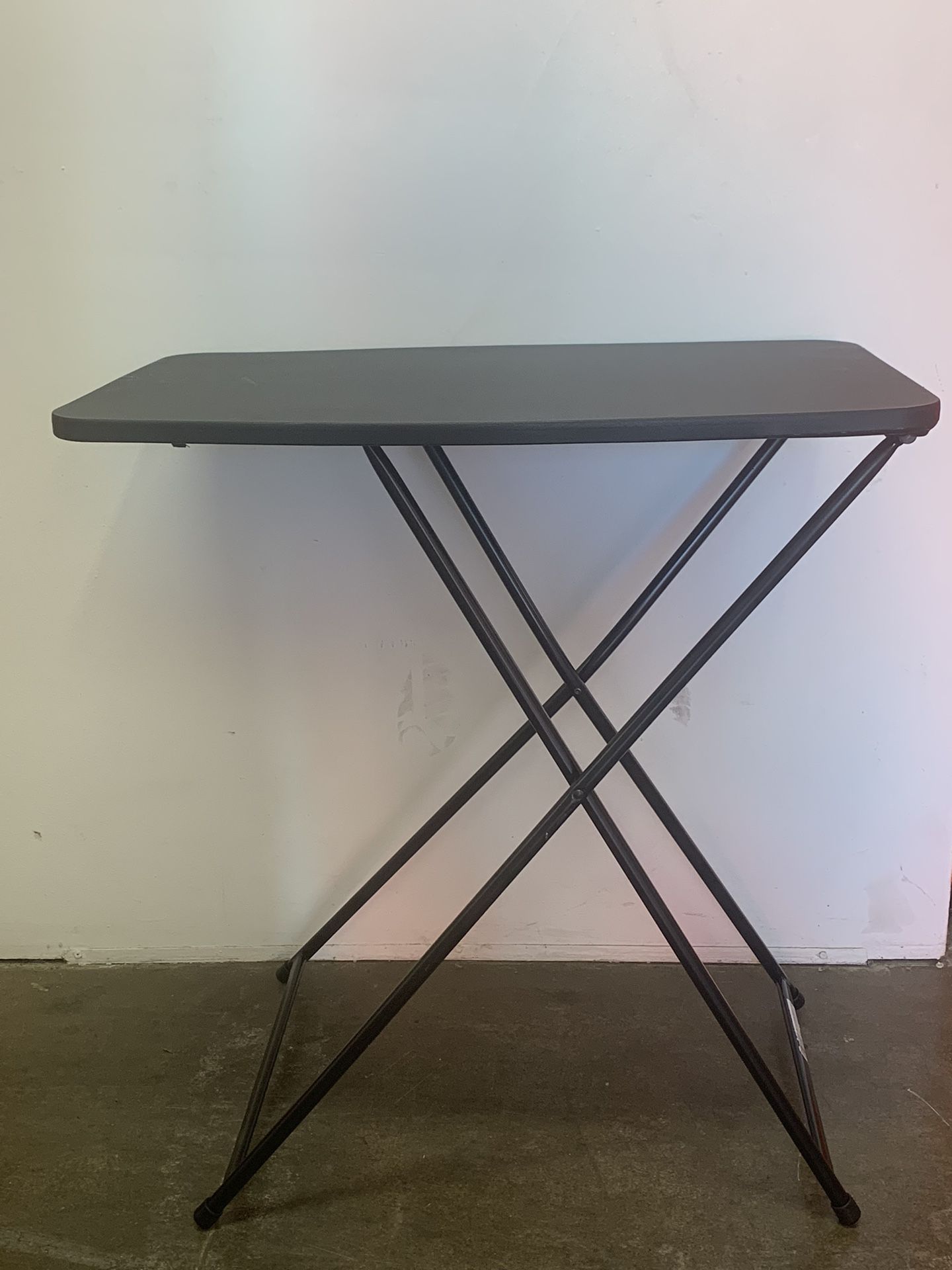 18 in. Black Plastic Adjustable Height Folding Utility Table