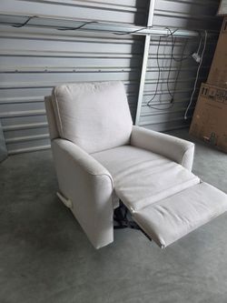 New Paxley Fabric Swivel Glider Recliner
Costco recliner
Retails for $600