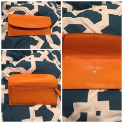 New orange leather coach wallet