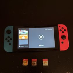 Nintendo Switch & 3 Games