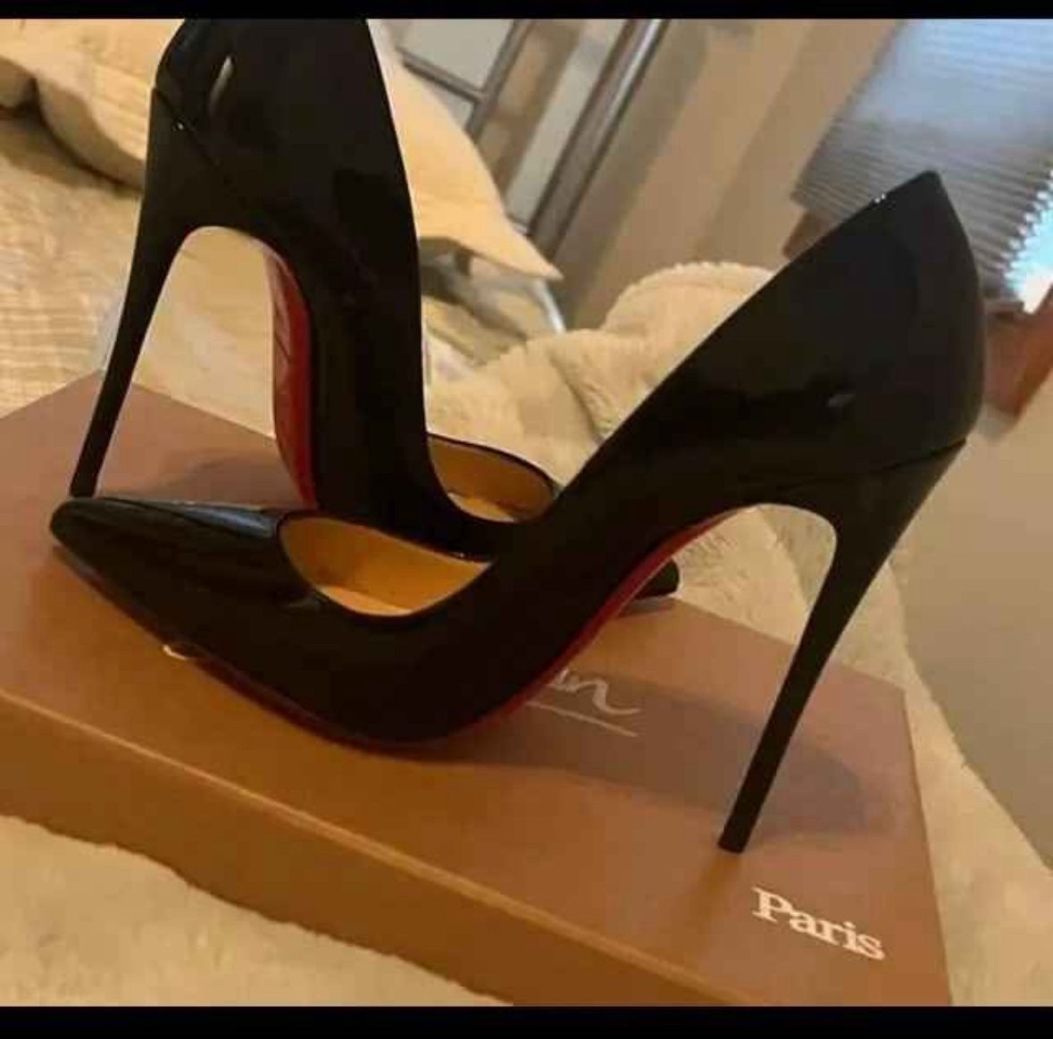 Woman’s Black Christian Louboutin Patent Leather Pumps