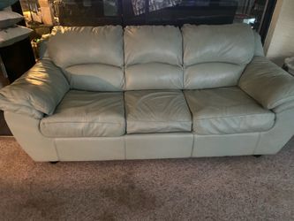 Leather queen sleep sofa , chair and ottoman( pillows not included)