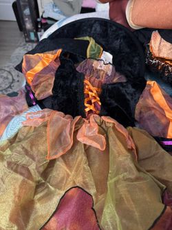 Which is costume little girl size in pictures