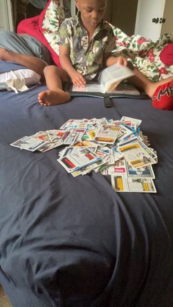 A pack of football soccer and basketball cards A pack of football soccer and basketball cards