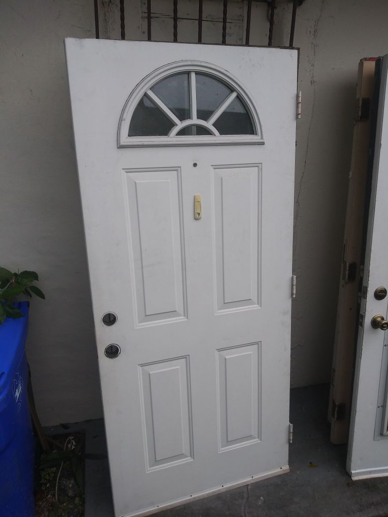 Exterior metal door with top lite