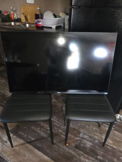 43 inch vision TV brand new lost screws to the legs not allowed to hang on my wall