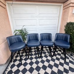 Blue/Faux leather 26.2-in H Counter height Upholstered Swivel Wood Bar Stool 4 -Pack