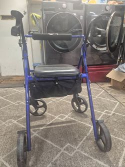 Hugo walker with seat and basket