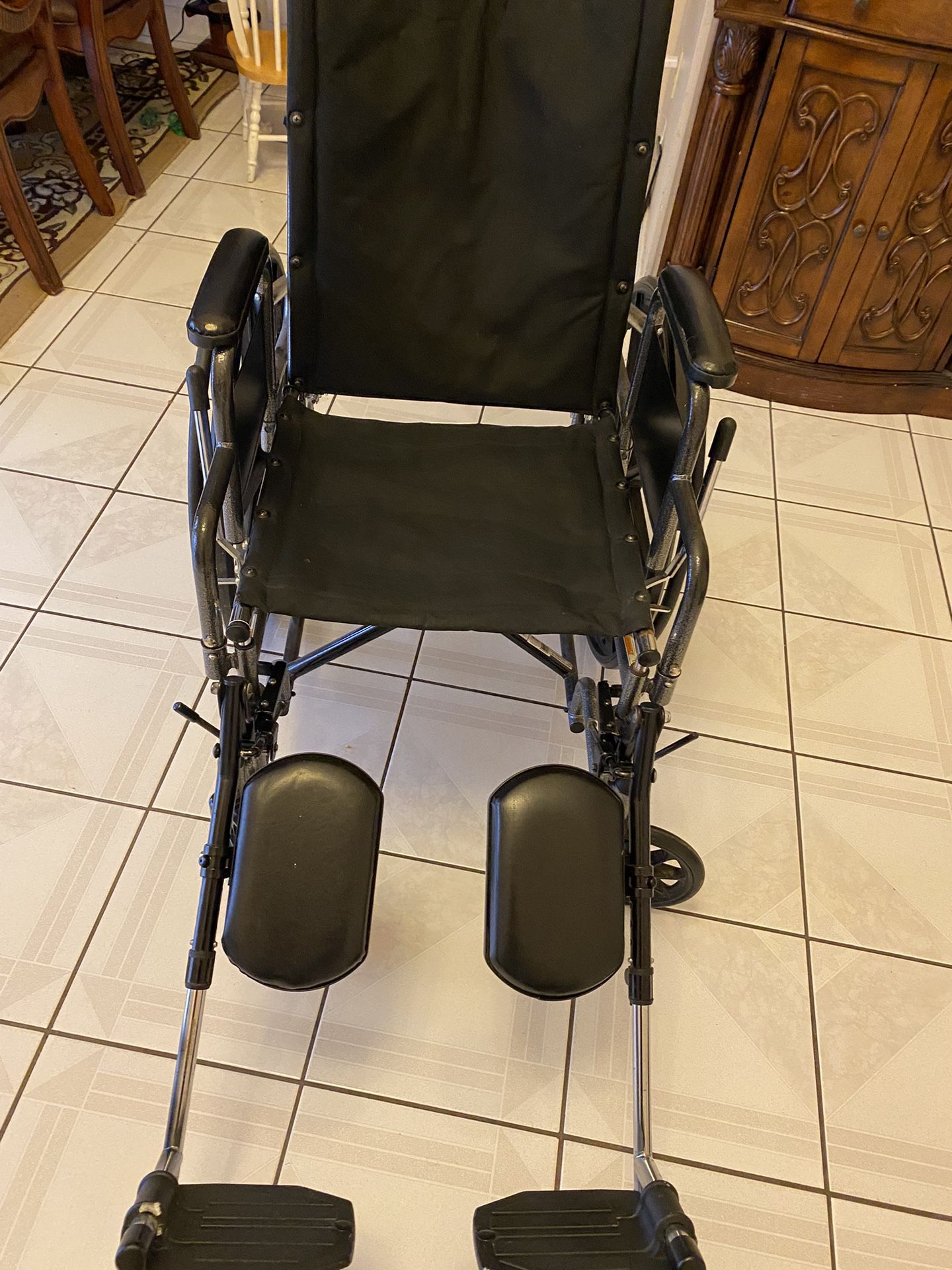 Wheelchair with elevated footrest 
