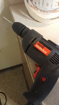 Drill master drill corded with built in level