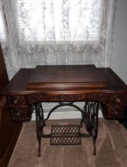 Antique sewing machine table