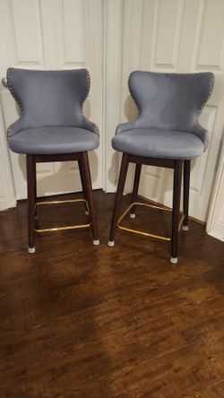 Fabric upholstered Counter Stools.
