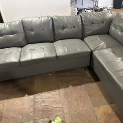 300.00 Grey Leather Couch 