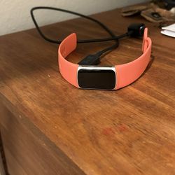Fitbit Charge 6 with Coral Band