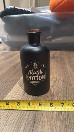 Glass battery operated light up potion decoration