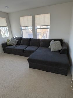 Living Spaces Charcoal Sectional Sofa w/ Large Chaise