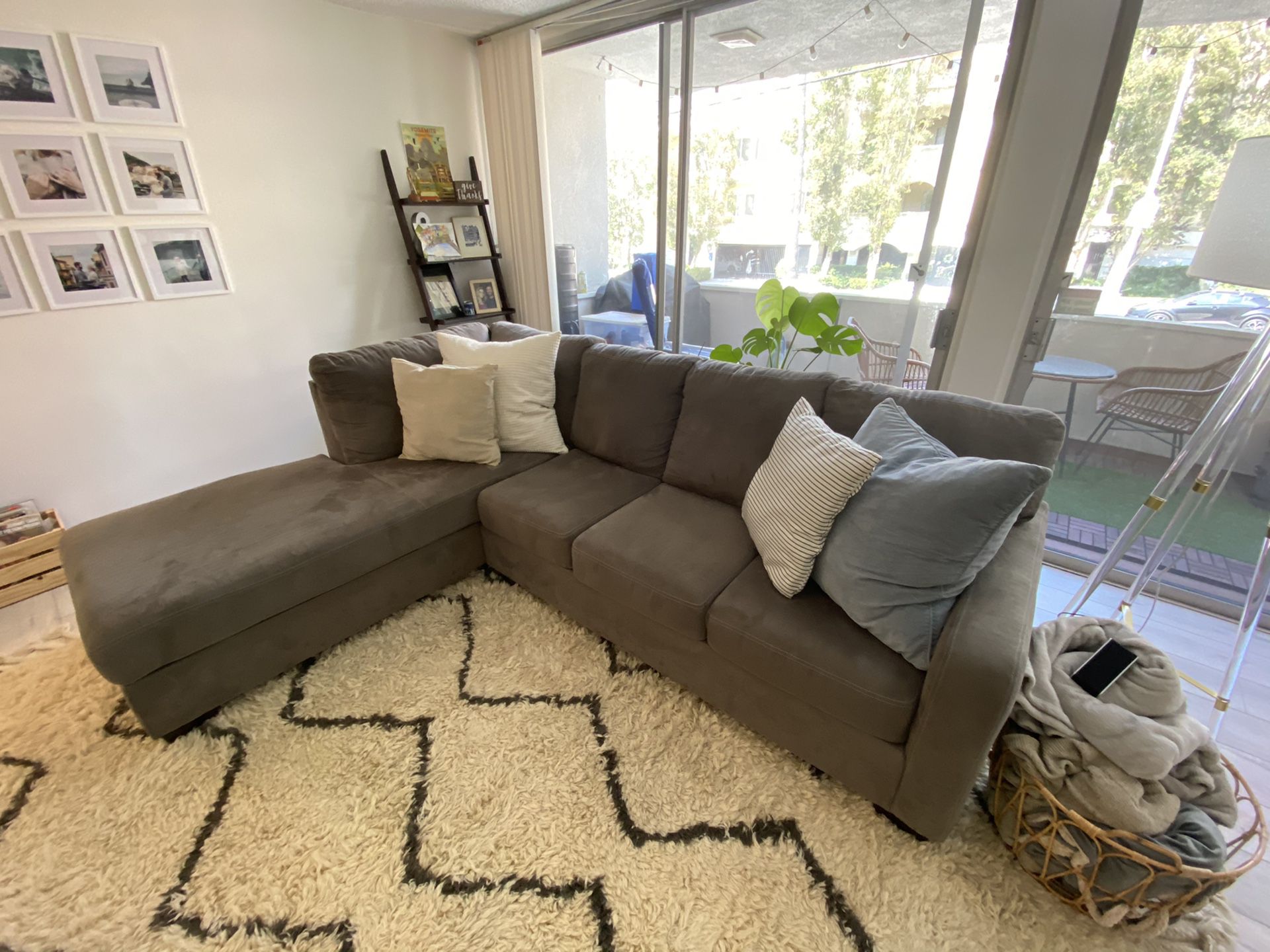 Grey Living Spaces Couch (right facing L)
