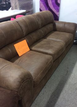 Close out sofa new Ashely made