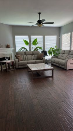 2 couches, 2 tables, and dining set.