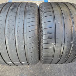 2 USED TIRES BRIDGESTONE 305/30/20