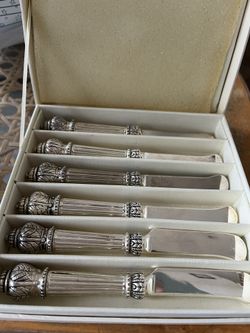 Neiman Marcus Silver Plate Set Of Knives