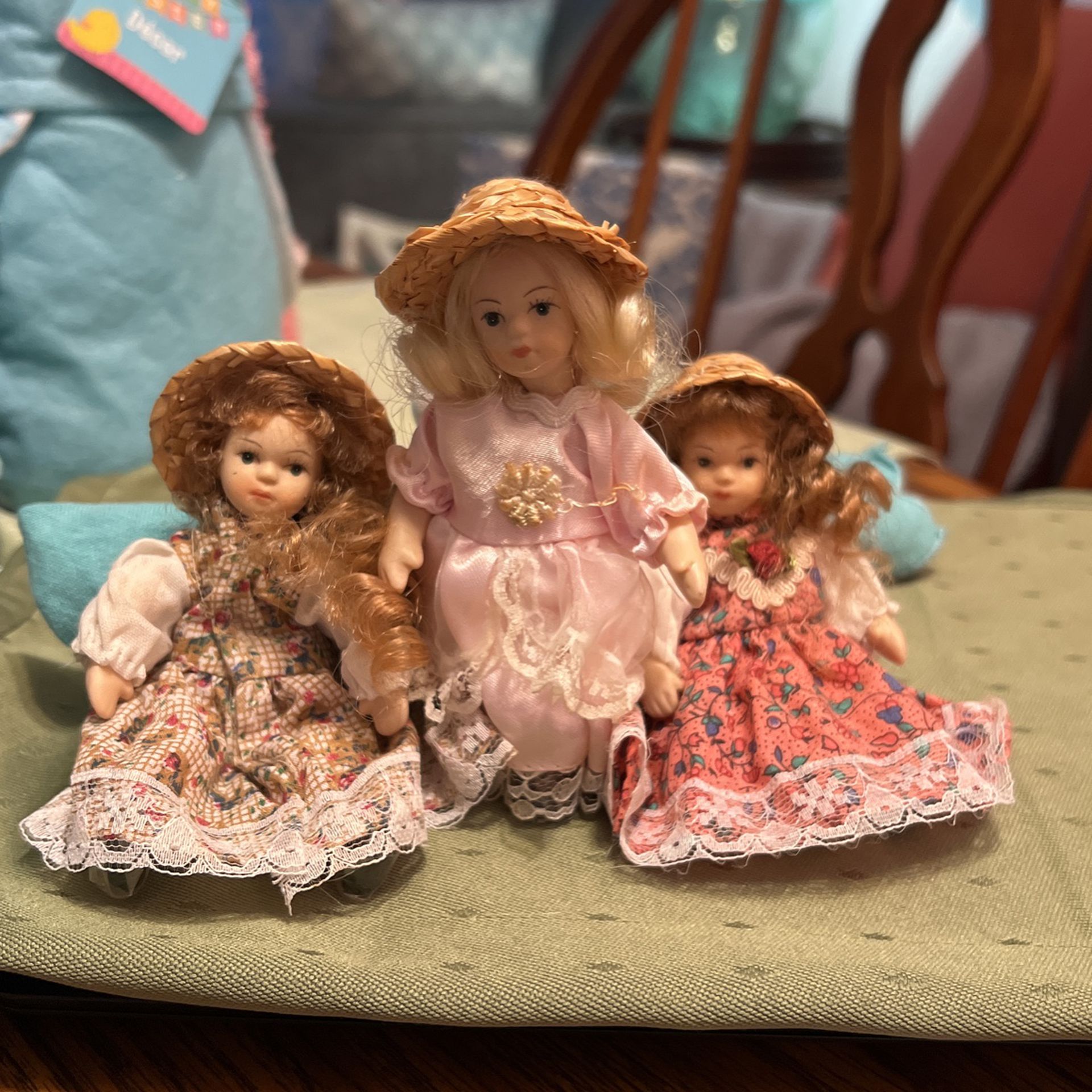 3 Small Porcelain Dolls