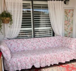 Mathis Bros. Green Sofa With Shabby Chic Slip Covet.