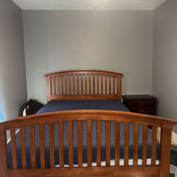 Bed Frame With Nightstand And A Bunke Board 