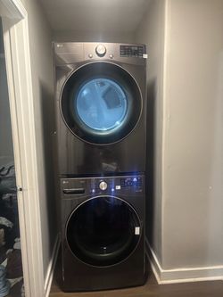 Brand new LG  front loading Washer & Dryer Grey