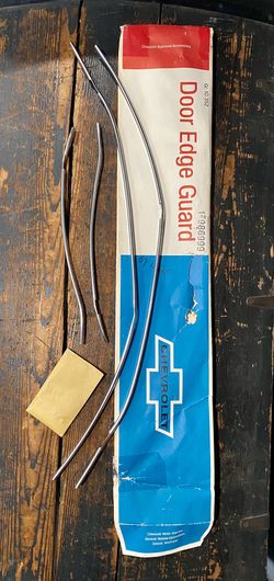 NOS 67 4 DOOR WAGON DOOR EDGE GAURDS