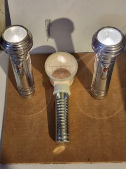 vintage Ray-O-Vac Sportsman metal flashlight.