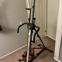Vertical climber exercise machine.  MaxiClimber XL-2000