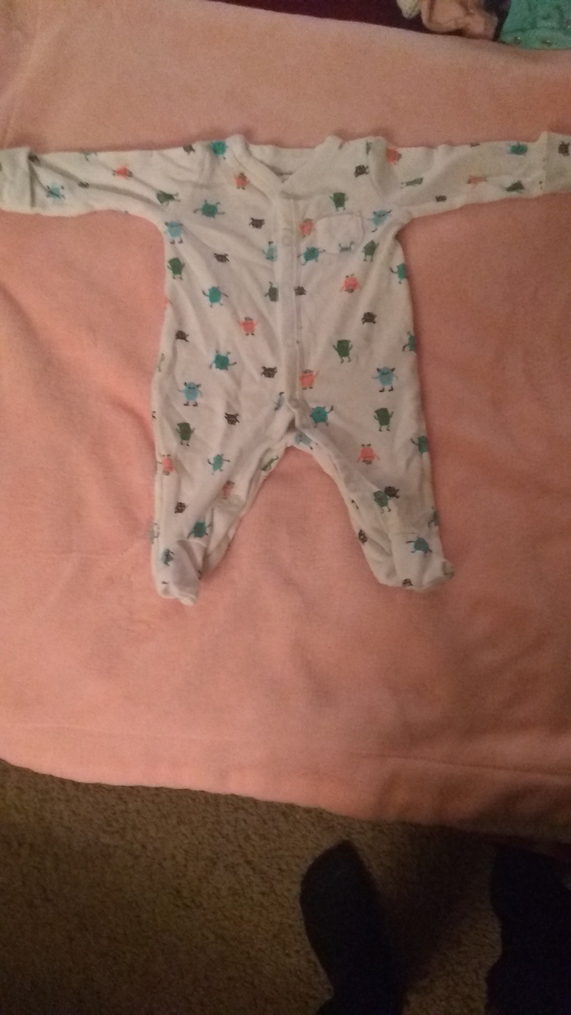 Carter's newborn onesie/mameluco de bebé de carters para recién nacidos