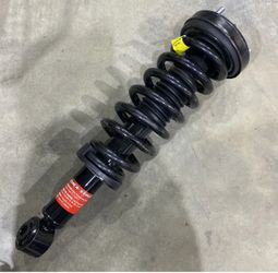 complete car strut and coil spring assembly
