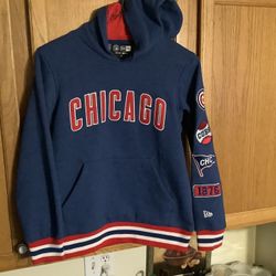 Chicago Cubs youth hoodie by New Era size medium HRD TO FIND with the various Cubs patches sewn on sleeve.  Genuine MLB Merchandise Worn once no snags