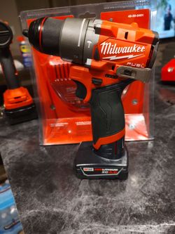 New Milwaukee M12 fuel 1/2" hammer drill/ battery and charger included