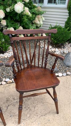 ANTIQUE SOLID WOOD SPINDLE BACK ARM CHAIRS . SET OF FOUR