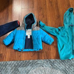 Three Kids Jackets In Different Size 