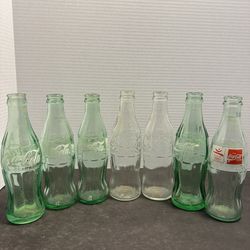 Lot of 7 Vintage Coca-Cola Coke Glass Bottles Barcelona 92 Greece Classic