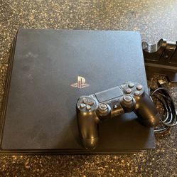 PS4 Pro 1TB with Controller and Charging Dock