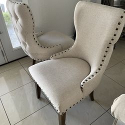 2 BEIGE CAPTAIN CHAIRS PICK UP TODAY